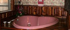 Heart Shaped Whilpool Tub in Cedar Splendor Cabin at a Lazee Daze in the Ozarks in Eureka Springs Arkansas
